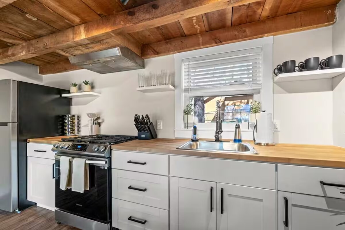 Fully equipped kitchen with butcher block counters