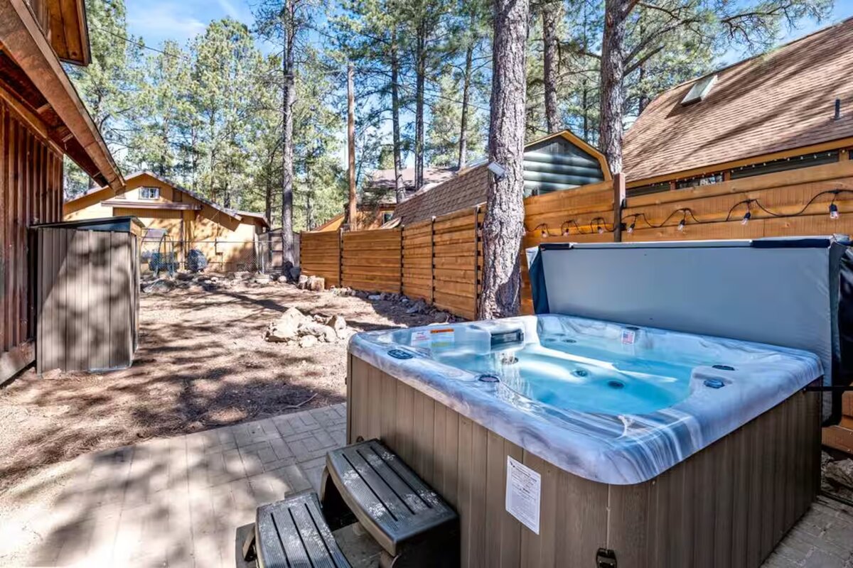 Hot tub with forest backdrop